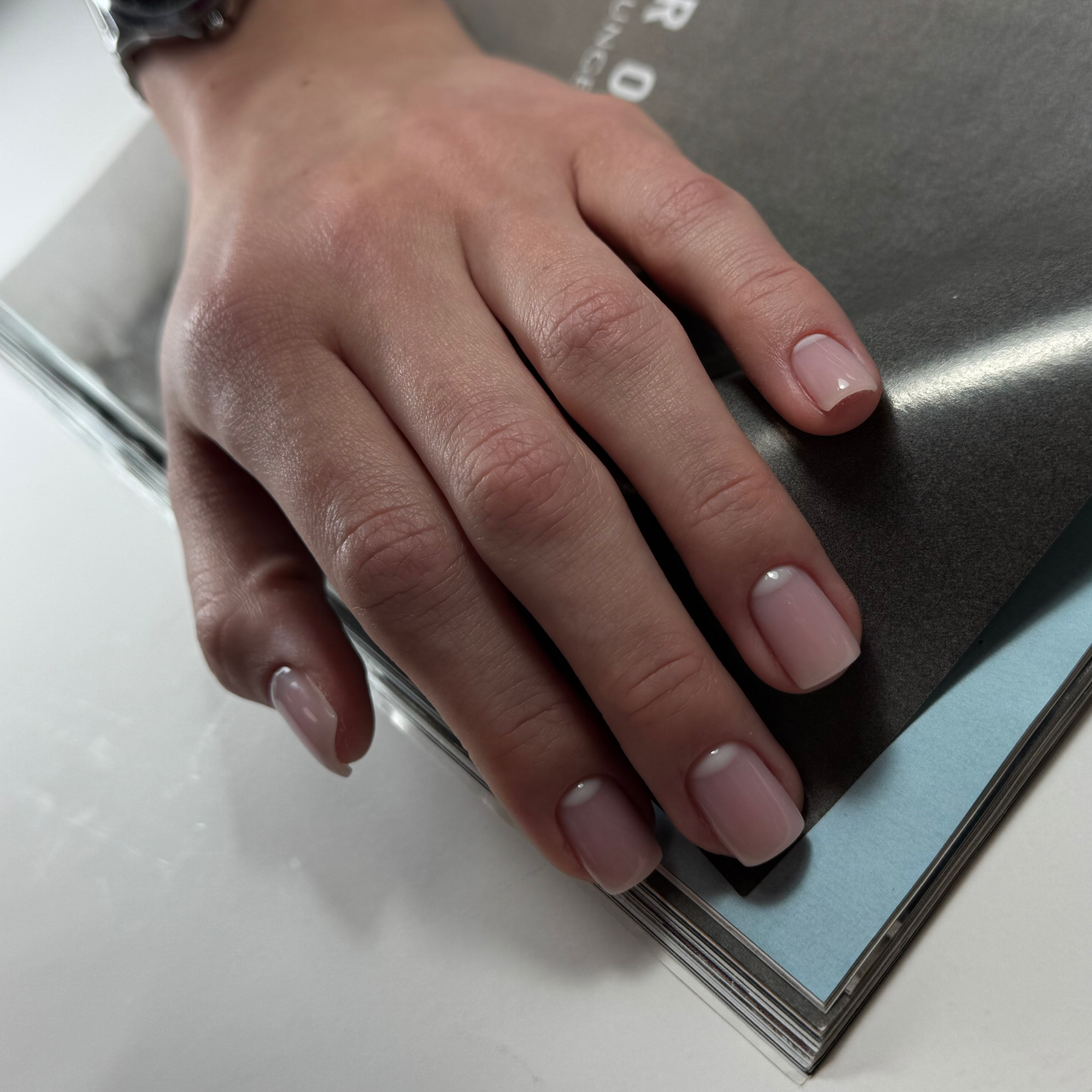 Hand-painted nail art on gel nails at a Mississauga nail salon